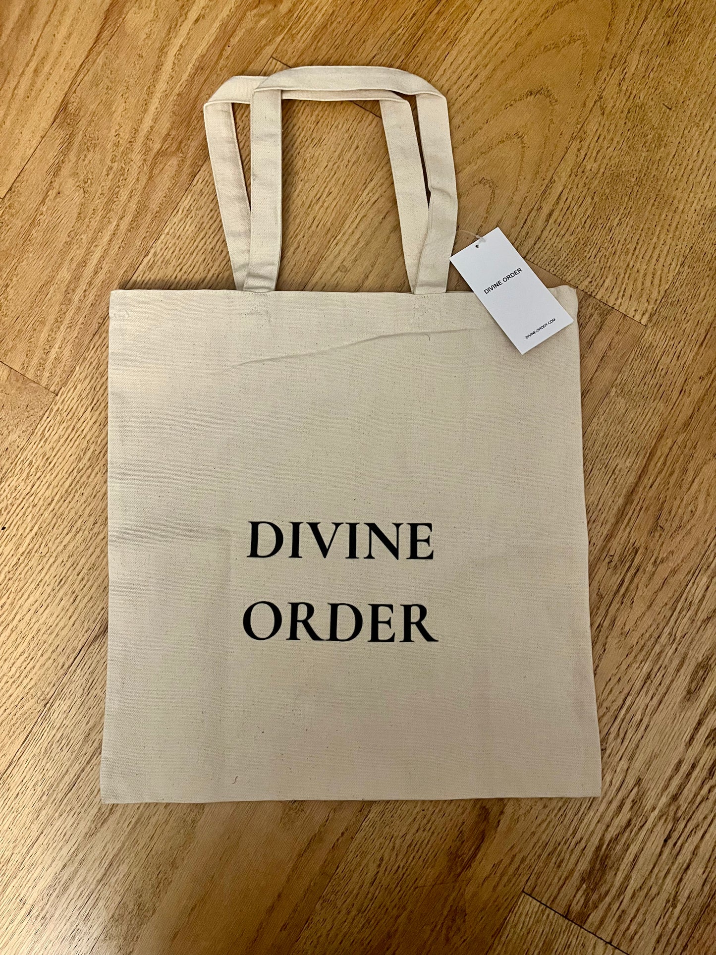 DIVINE ORDER Tote Bag