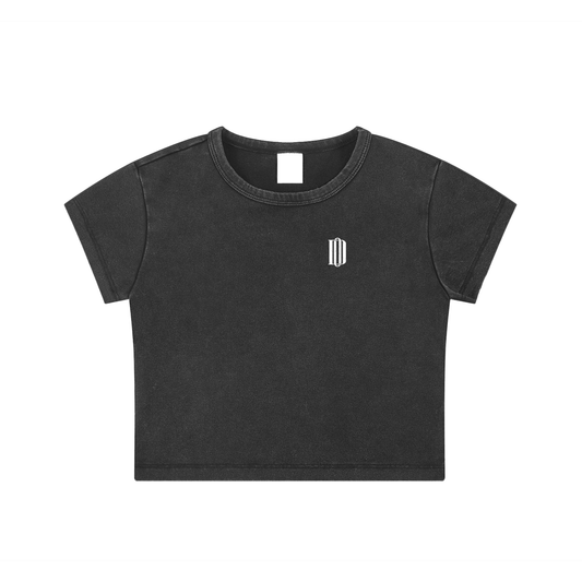 Black t-shirt with a small logo on a white background