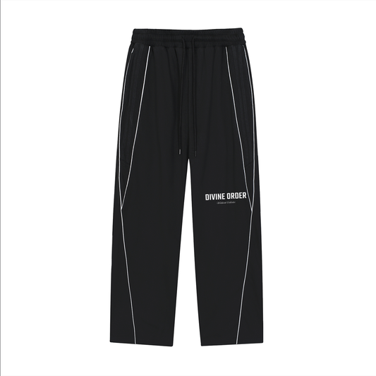 Black pants with white accents and 'Divine Order' branding on a white background