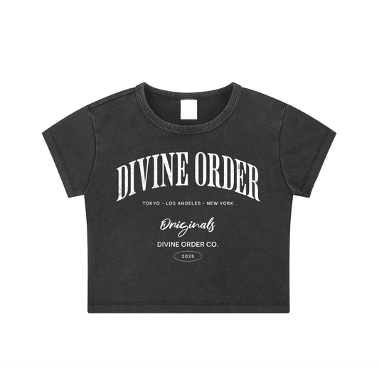 Black crop top with 'Divine Order' branding on a white background