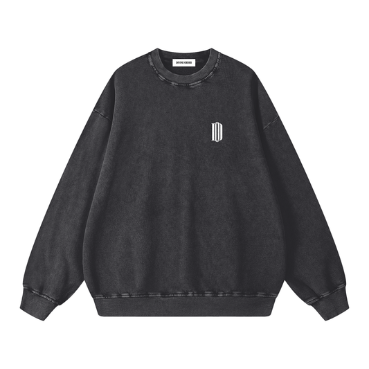 Black sweatshirt with a small logo on a white background